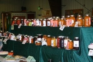 Canned fruit and preserves lined up for judging at the Utah County Fair. Photo Courtesy: Utah County Fair Canned fruit