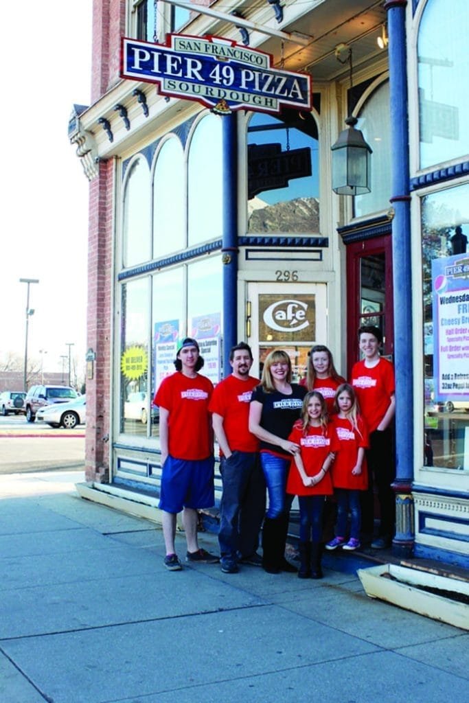 Springville’s Pier 49 pizza restaurant has new owners Pizza Owners 696x1043 1 683x1024