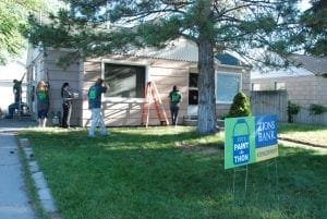 Zions employees give a home a fresh paint job.Photo: Zions Bank paint-a-thon
