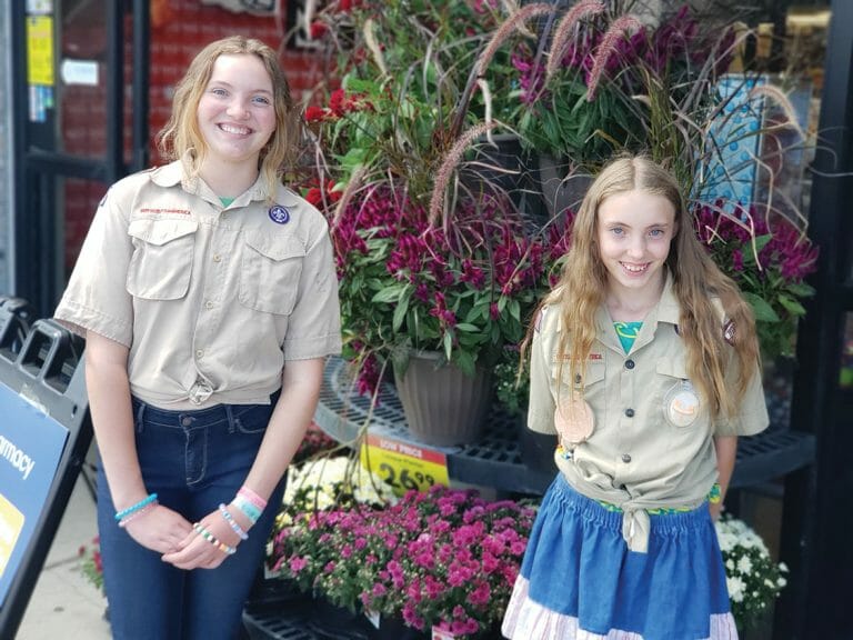 Sadie Beal and Amelia Davis raising money via a popcorn fundraiser at the Smith’s Food & Drug in Payson.