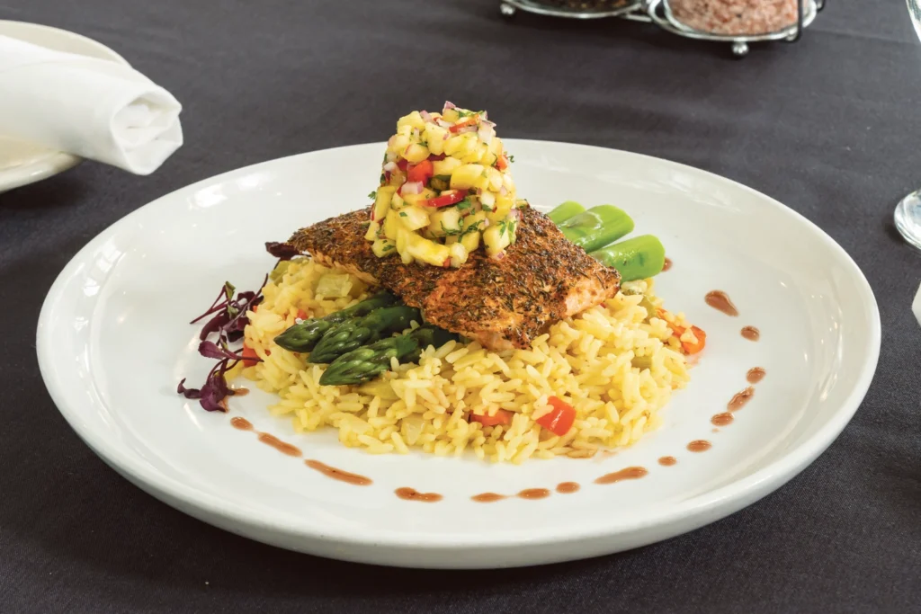 Maglebys - blackened salmon with pineapple salsa served on top of rice pilaf. Photos by Pete Hansen.