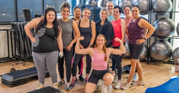 A high-energy group fitness class at FitCity Center in Spanish Fork focusing on strength training and self-preparedness.