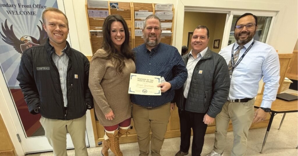 Joe Governale, ALA Teacher of the Month, smiling at American Leadership Academy.
