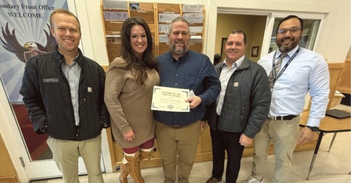 Joe Governale, ALA Teacher of the Month, smiling at American Leadership Academy.