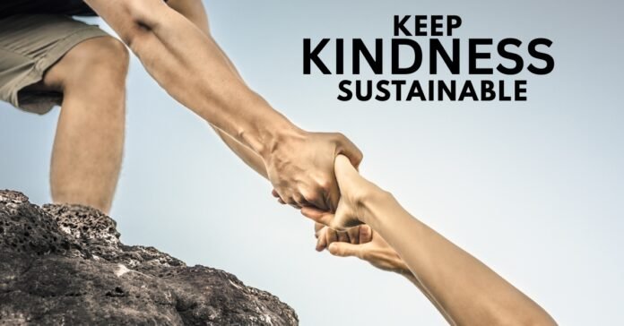 A person securely anchored on a rock while helping another, symbolizing safe boundaries and self-preparedness.