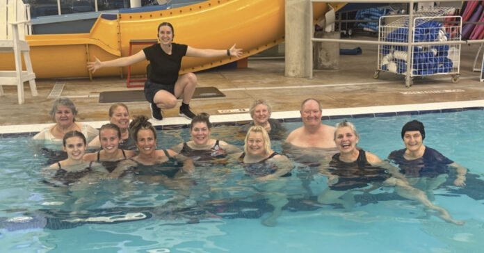 Alli Moon leading an energetic AquaFit class at the Clyde Recreation Center pool in Springville.