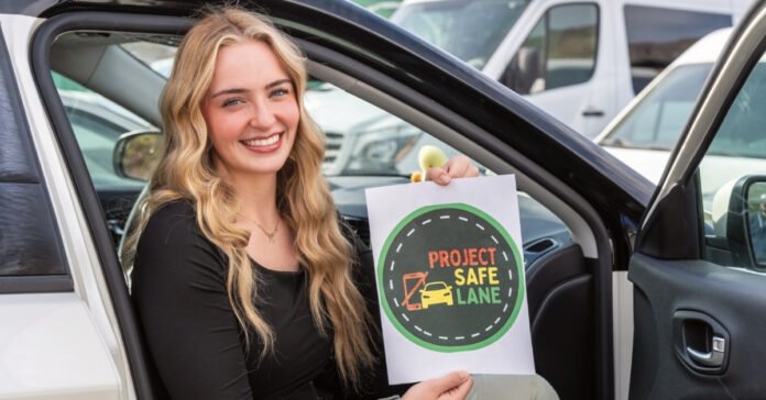 Daisy Findlay promotes Project Safe Lane, an initiative dedicated to educating drivers on the dangers of distracted driving. Findlay and her supporters urge the community to put phones away while behind the wheel.