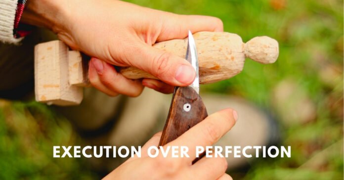 A person working on a physical project, demonstrating the importance of execution over just having an idea.