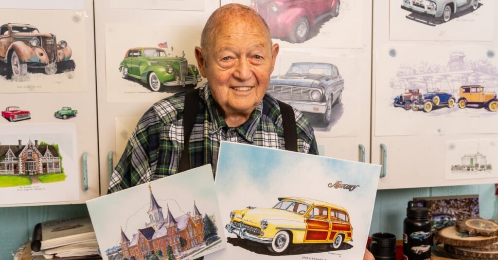 Self-taught Springville artist Fred Mertlich displaying his historic illustrations of classic cars and buildings.